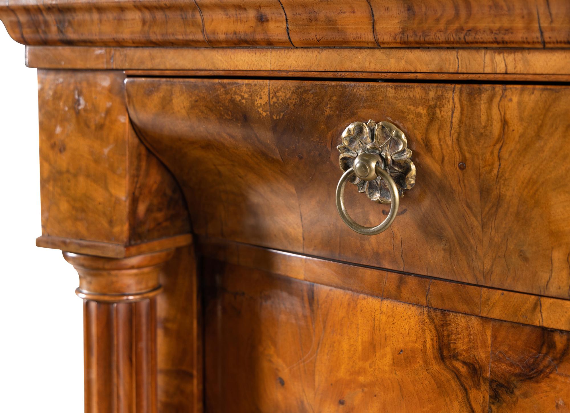 A Biedermeier Figured Walnut Cabinet