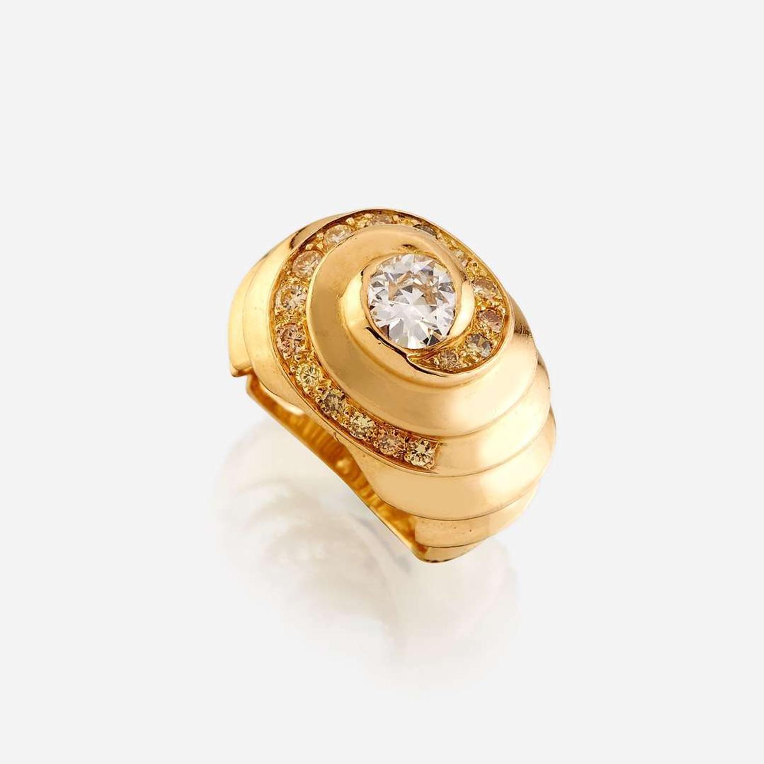 A diamond, colored diamond, and eighteen karat gold ring