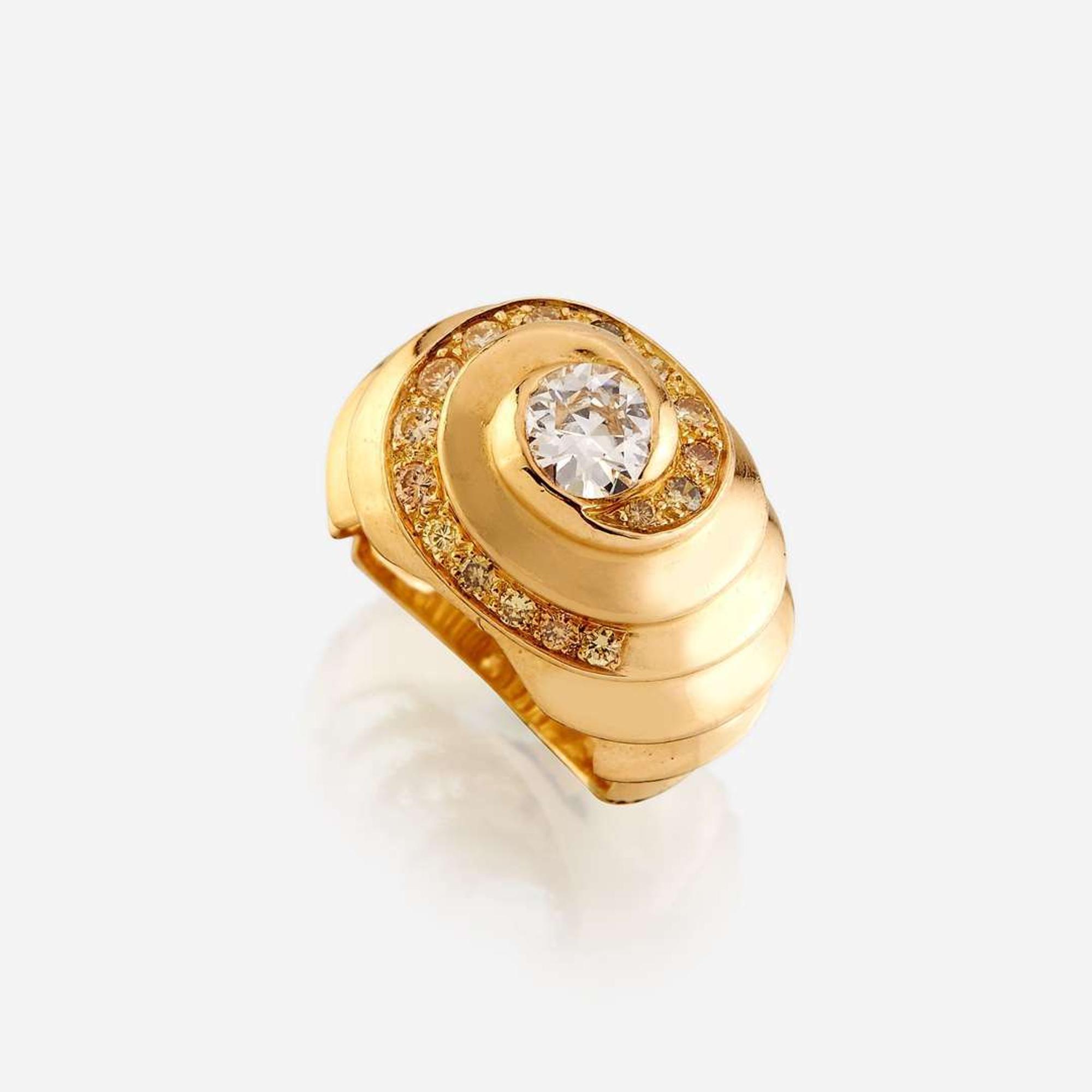 A diamond, colored diamond, and eighteen karat gold ring