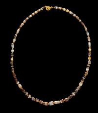 A Western Asiatic Banded Agate Necklace