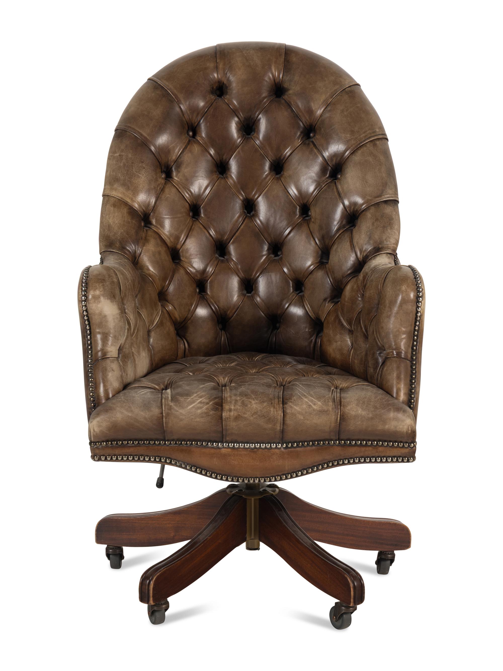 A Button-Tufted Leather Desk Chair