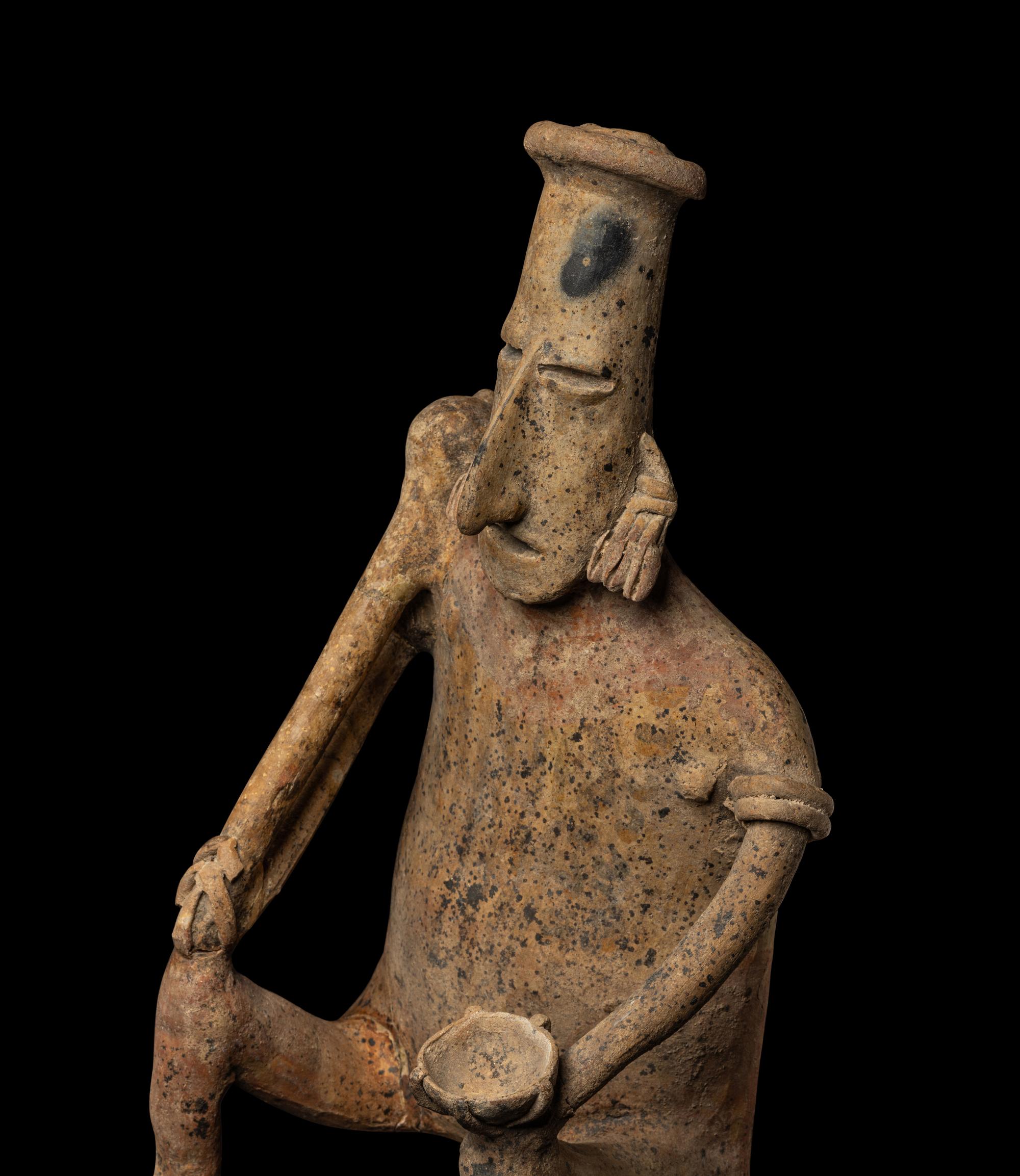 A Nayarit Seated Figure