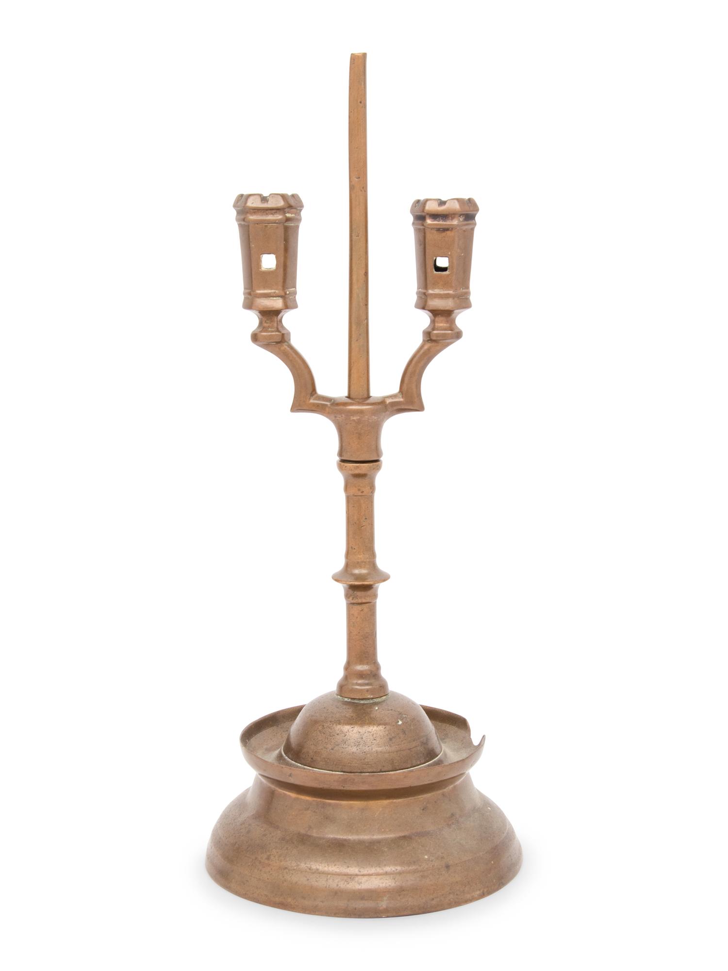 A Southern German Three Kings Two-Light Candlestick