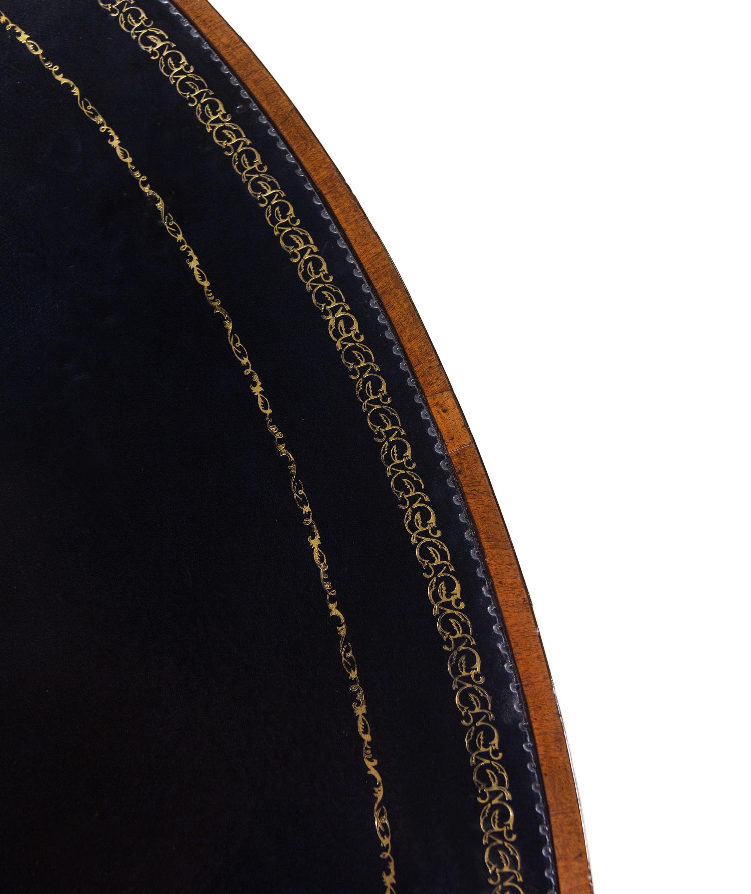 A Regency Mahogany Oval Drum Table