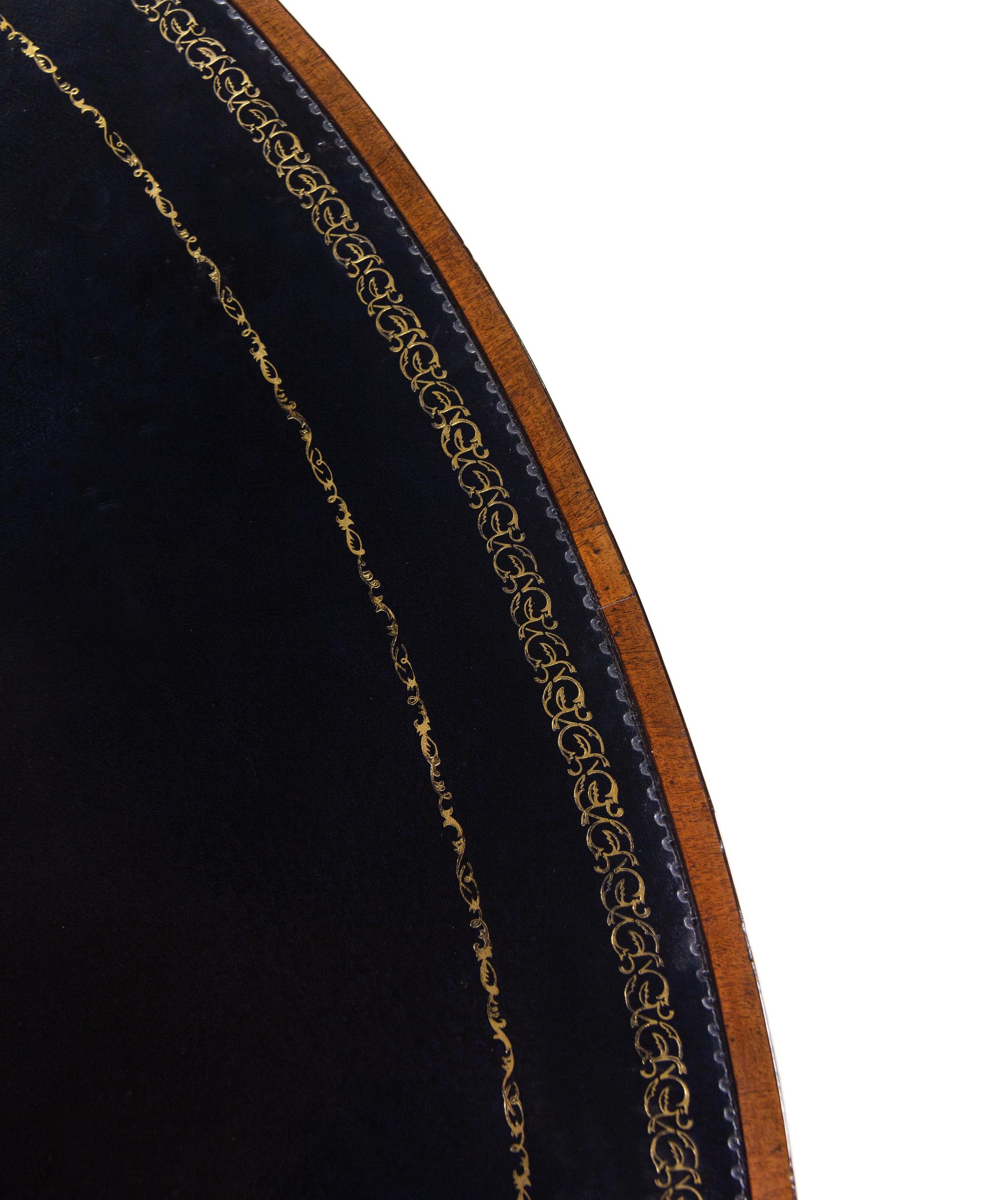 A Regency Mahogany Oval Drum Table