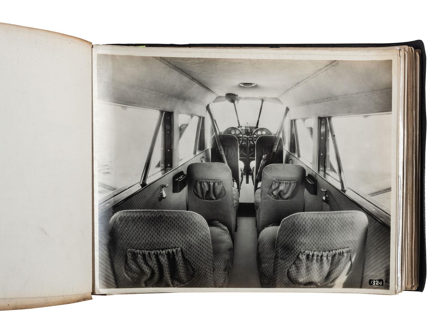 [AVIATION]. SMITH, Edgar B. (1896-1966), photographer. Rare photographic salesman aviation album documenting various airplanes and their construction at the plant of the Travel Air Manufacturing Company of Wichita, Kansas. Ca 1929.