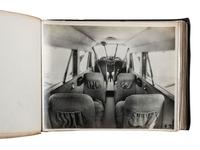 [AVIATION]. SMITH, Edgar B. (1896-1966), photographer. Rare photographic salesman aviation album documenting various airplanes and their construction at the plant of the Travel Air Manufacturing Company of Wichita, Kansas. Ca 1929.