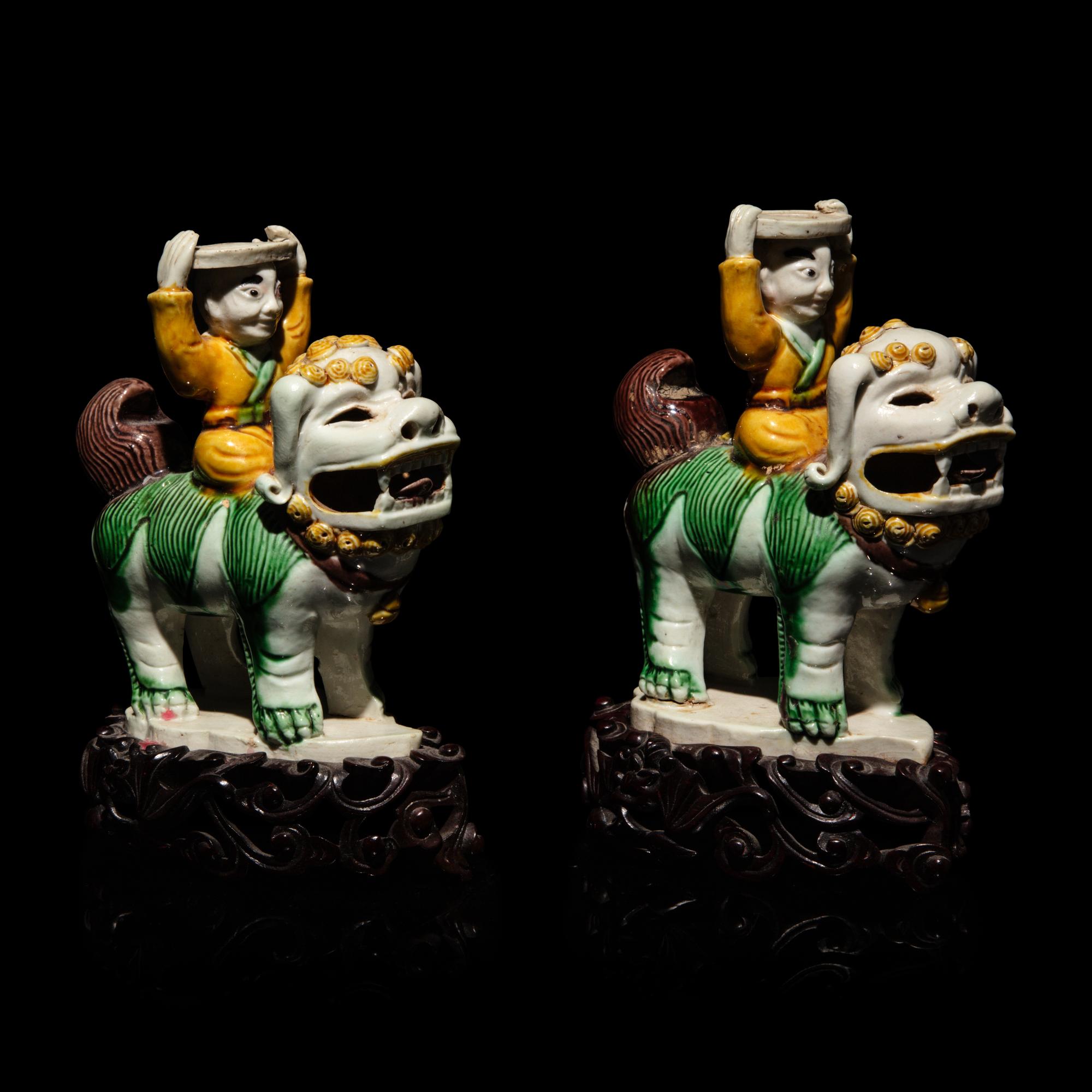 A Pair of Small Chinese Enameled Figures on Lions