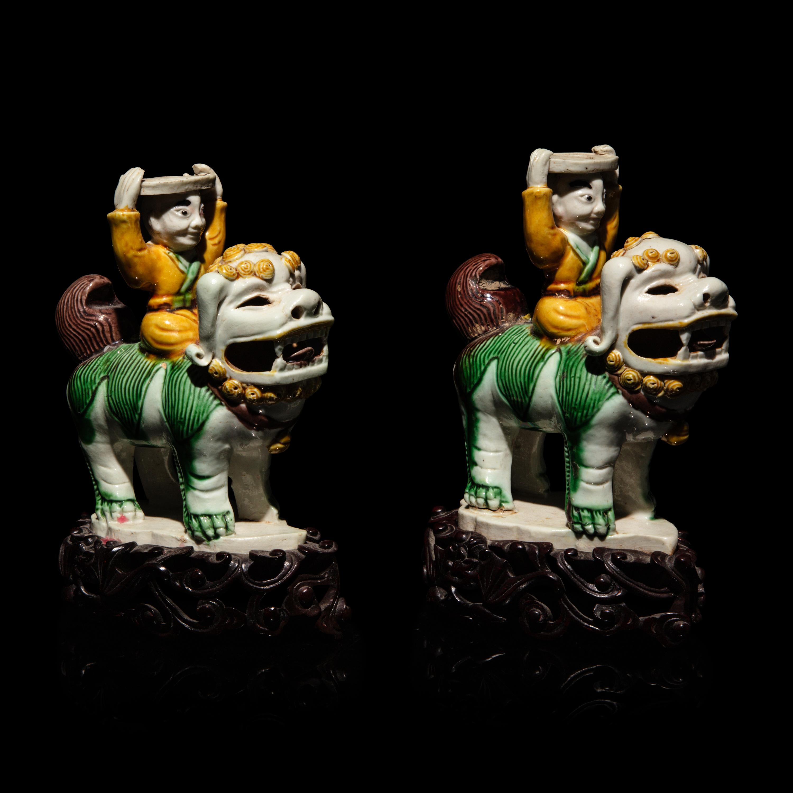A Pair of Small Chinese Enameled Figures on Lions