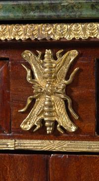 A Louis XVI Style Gilt Metal Mounted Mahogany Commode à Vantaux After the Model by Guillaume Benneman