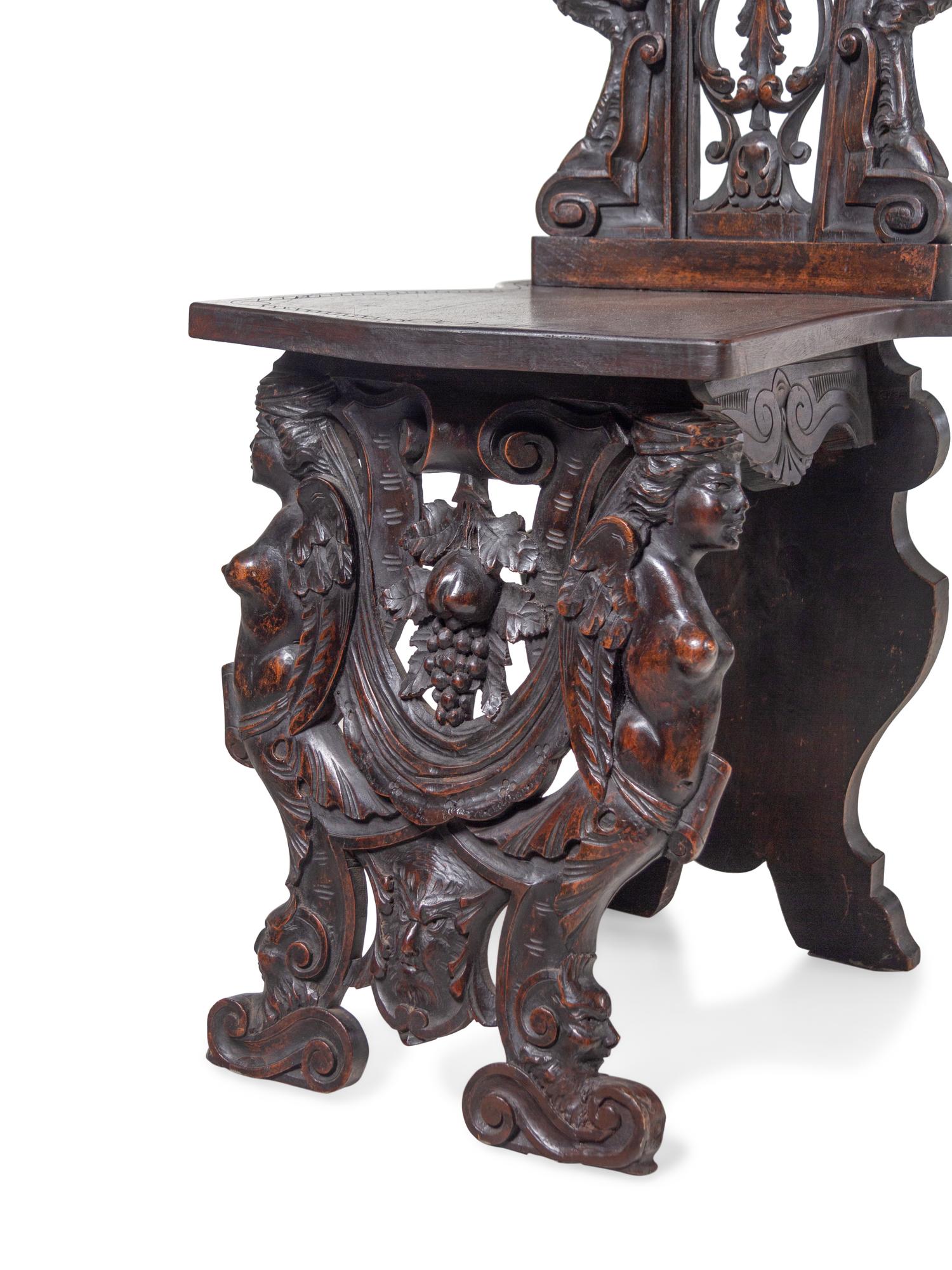 An English Renaissance Revival Carved Mahogany Hall Chair