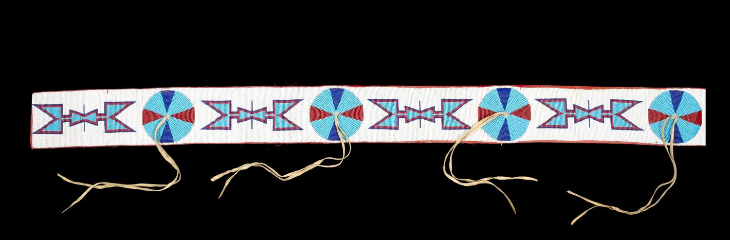 A Crow Beaded Blanket Strip Length 57 inches.