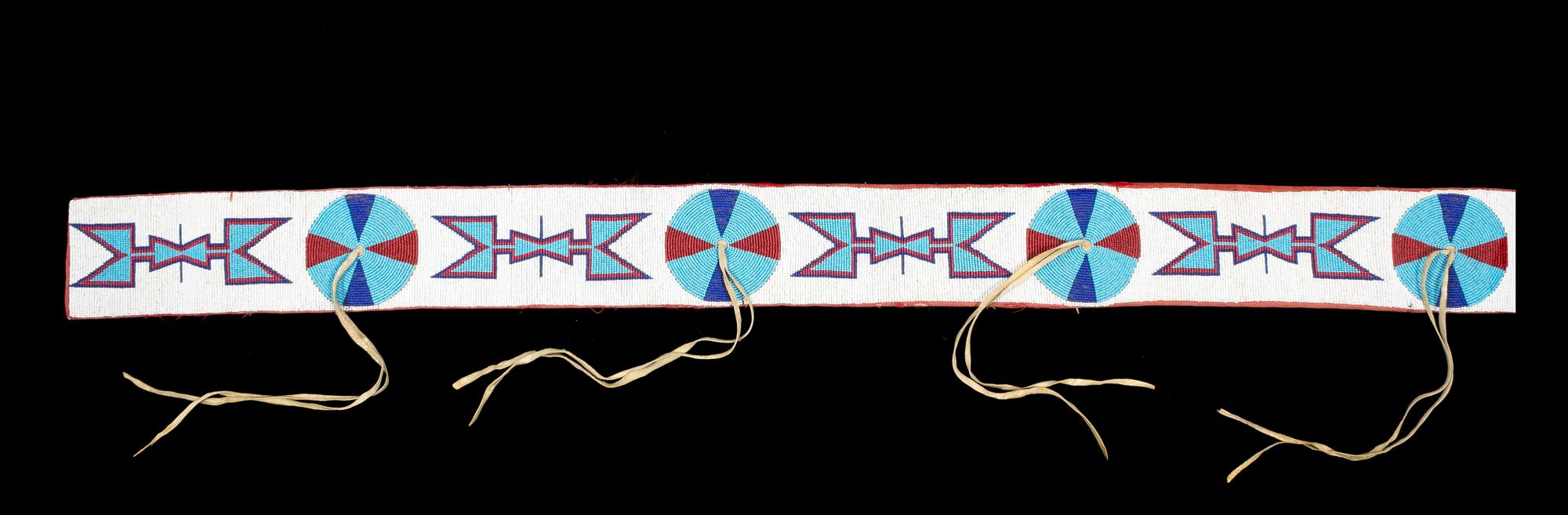 A Crow Beaded Blanket Strip Length 57 inches.