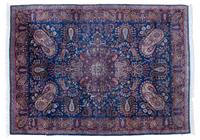 An Oriental Wool Rug 11 feet 7 1/2 inches x 8 feet 10 1/2 inches.