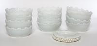 A Set of Twelve Milk Glass Bowls Height 1 3/4 inches.