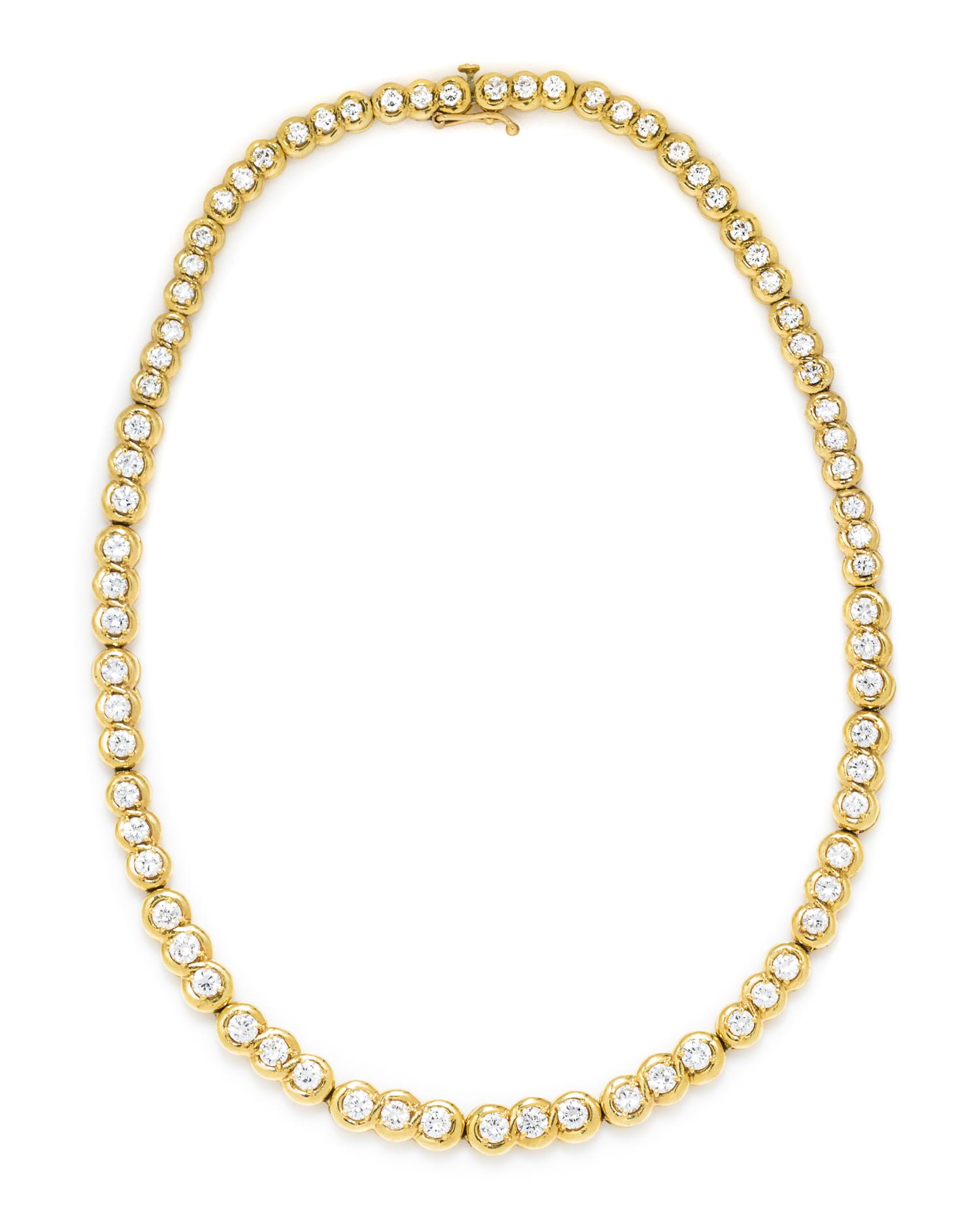 A Graduated Yellow Gold and Diamond Necklace, 27.70 dwts.