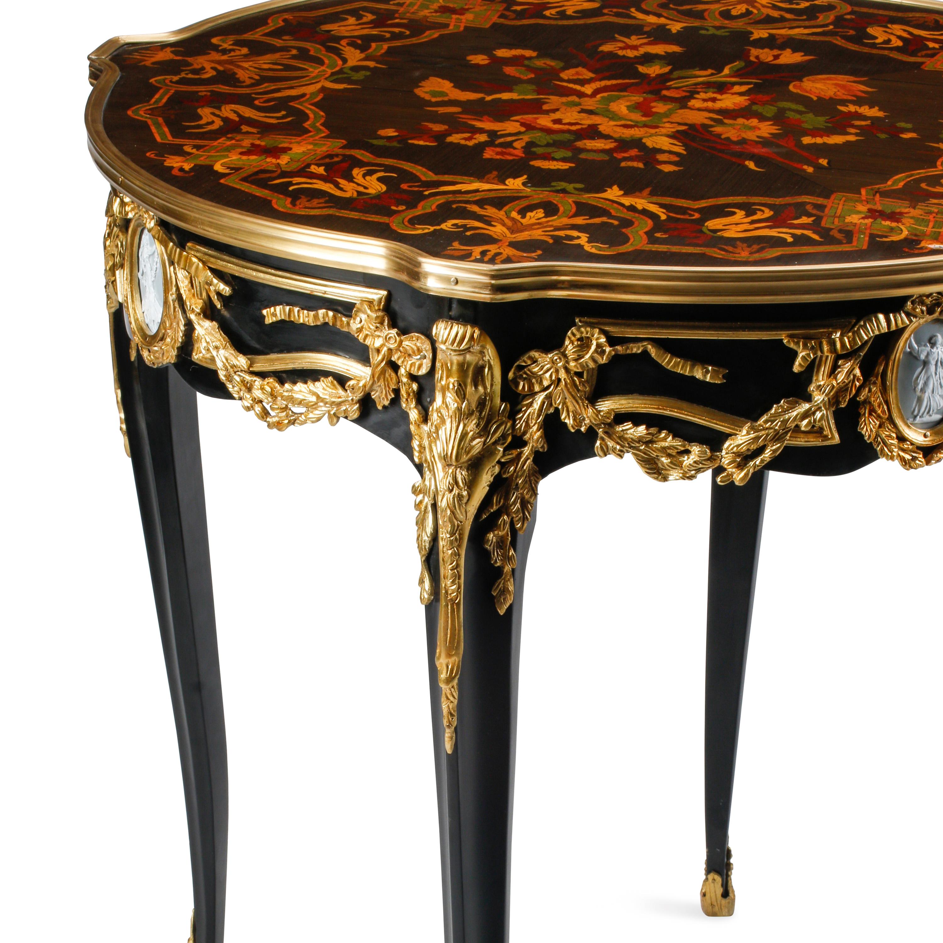 A Pair of Louis XV Style Gilt Bronze Mounted Marquetry Side Tables
