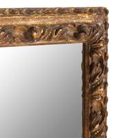 A Continental Carved Giltwood Mirror