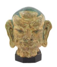 A Rare Large Chinese Sancai Glazed Pottery Head of Lohan MING DYNASTY Height 16 1/4 inches (with stand). — MING DYNASTY