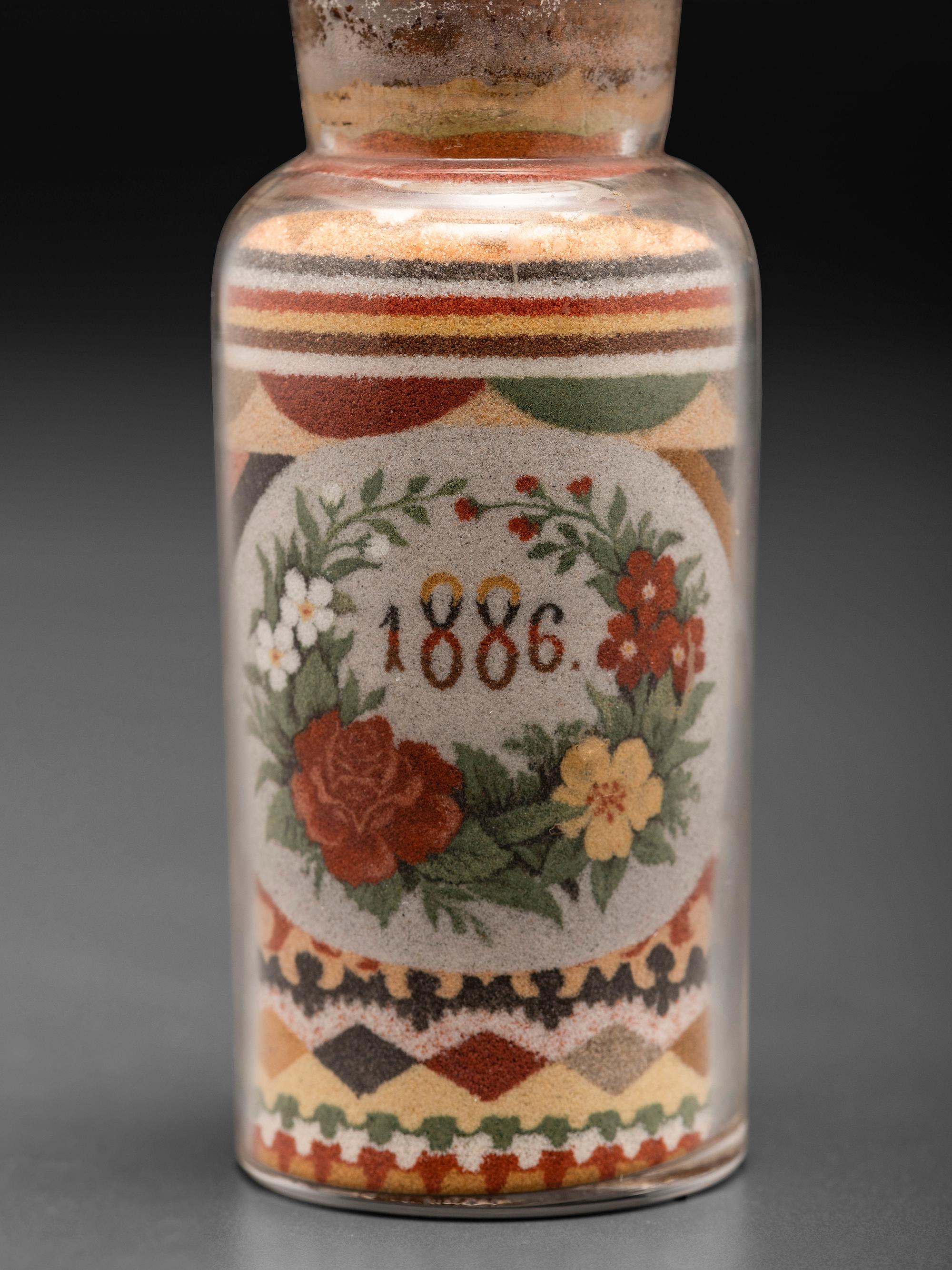 An Andrew Clemens (American, 1857-1894) Eagle Sand Bottle
