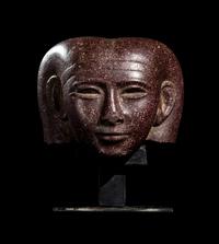A Roman Porphyry Head of an Egyptian Woman