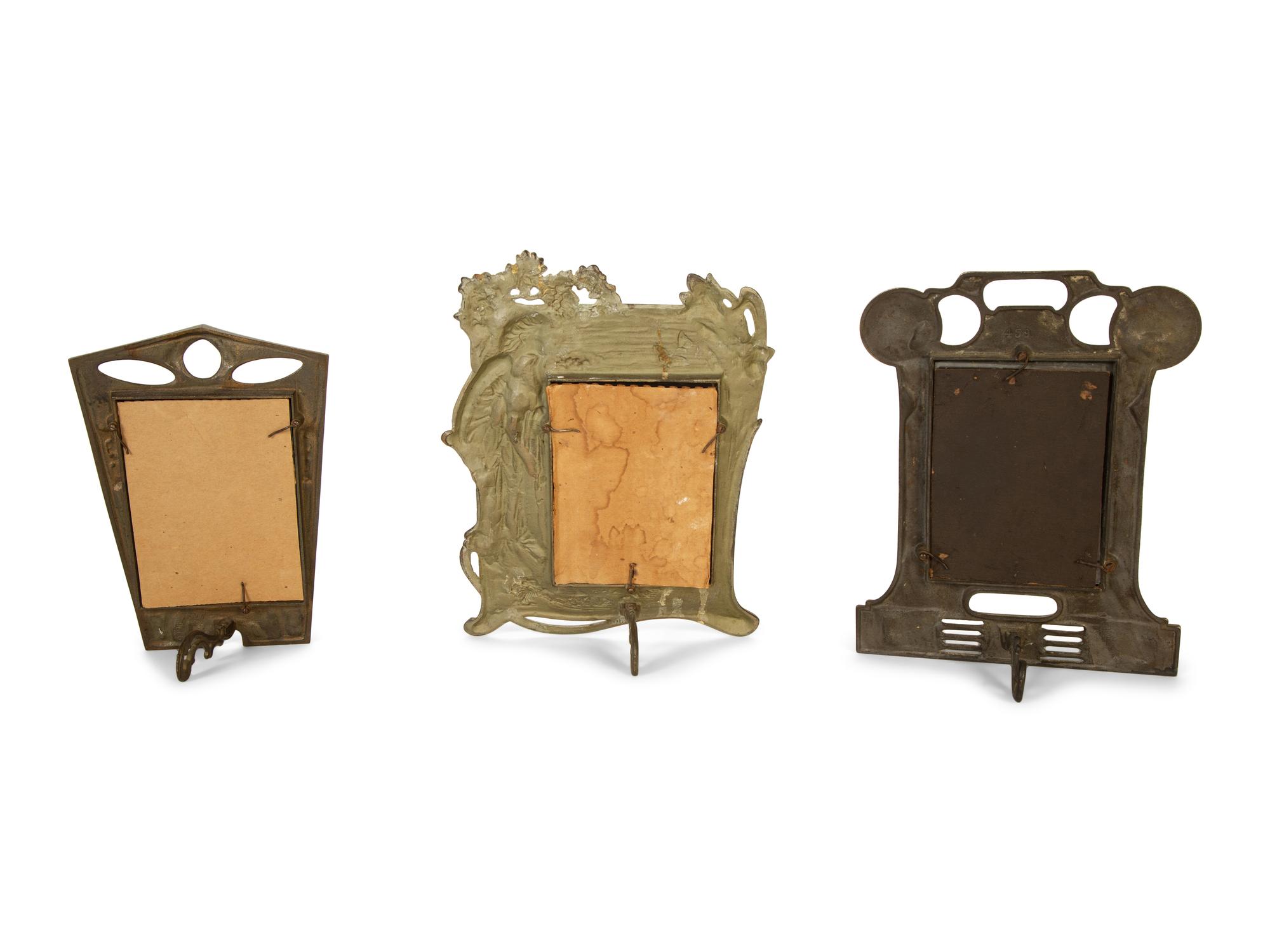 Three Art Nouveau Patinated Bronze Standing Picture Frames