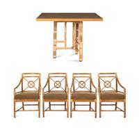 A Set of Four McGuire Rattan Target Armchairs and an Organic Bamboo Table