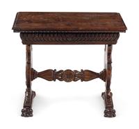 A Renaissance Revival Carved Walnut Low Trestle Table