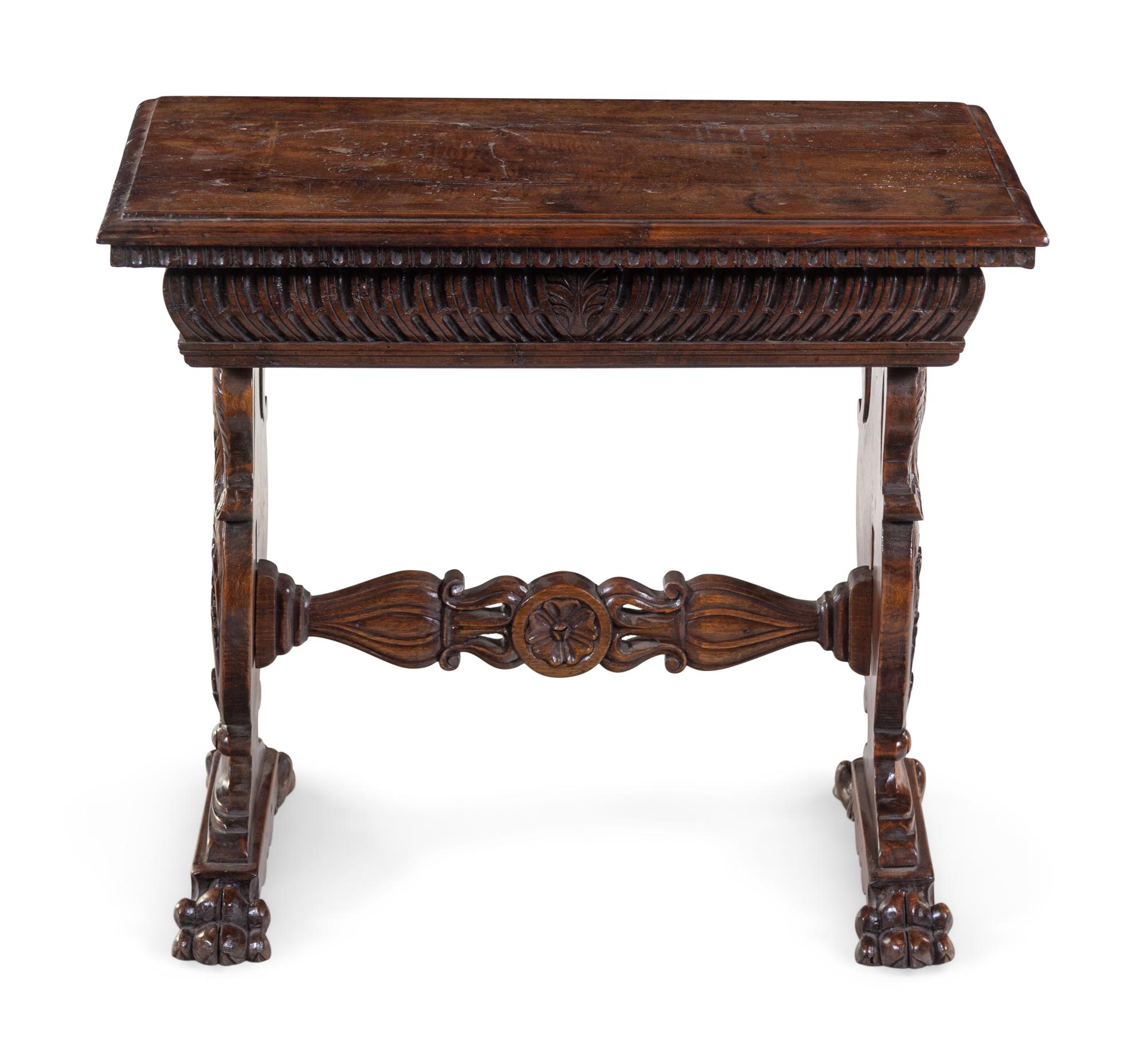 A Renaissance Revival Carved Walnut Low Trestle Table