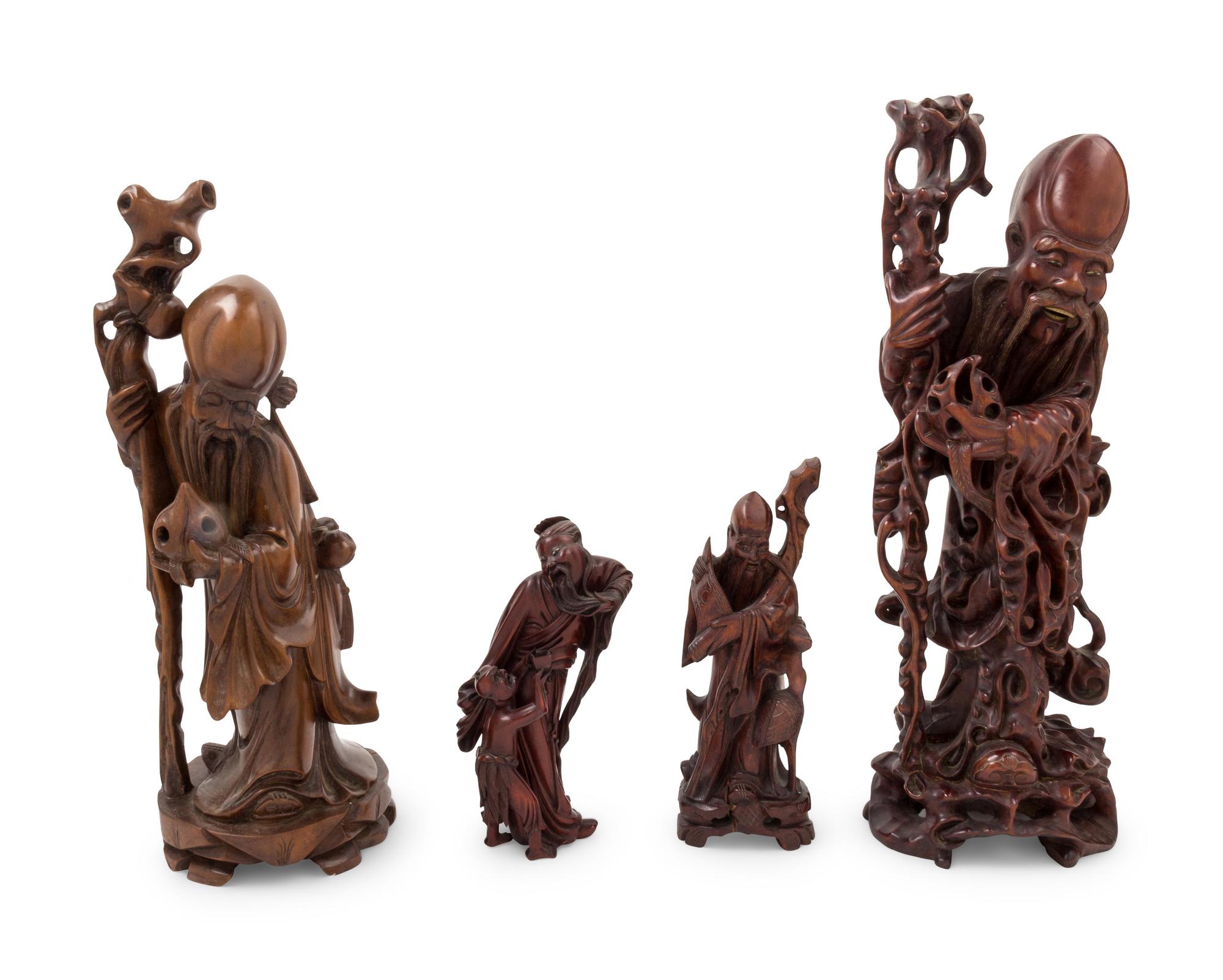 Four Chinese Carved Hardwood Figures