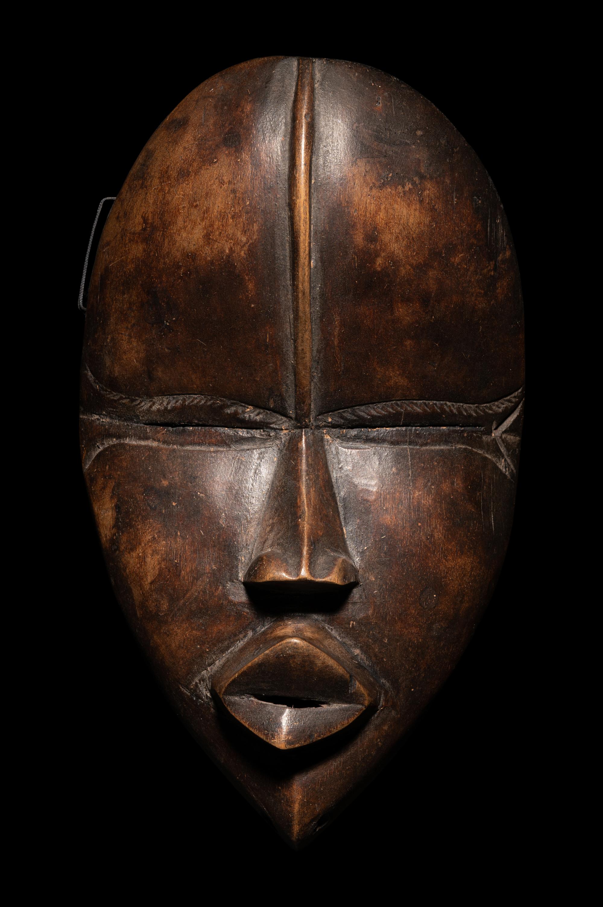 Three Dan Wood Masks