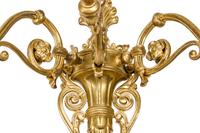 A Set of Four Large Gilt Bronze Three-Light Sconces