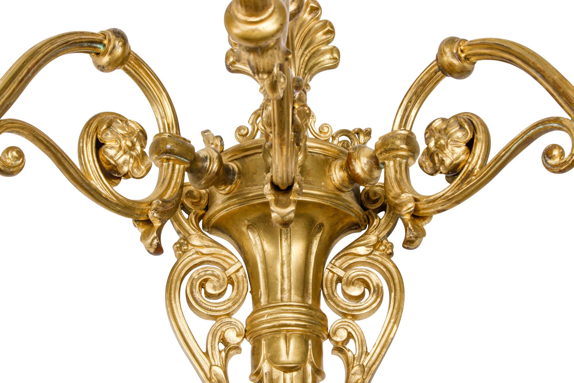 A Set of Four Large Gilt Bronze Three-Light Sconces