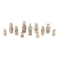 A Group of Eleven Chinese Export Porcelain Famille Rose Vases