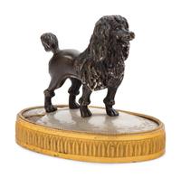 A Continental Gilt and Patinated Bronze Mother of Pearl Inset Figure of a Poodle