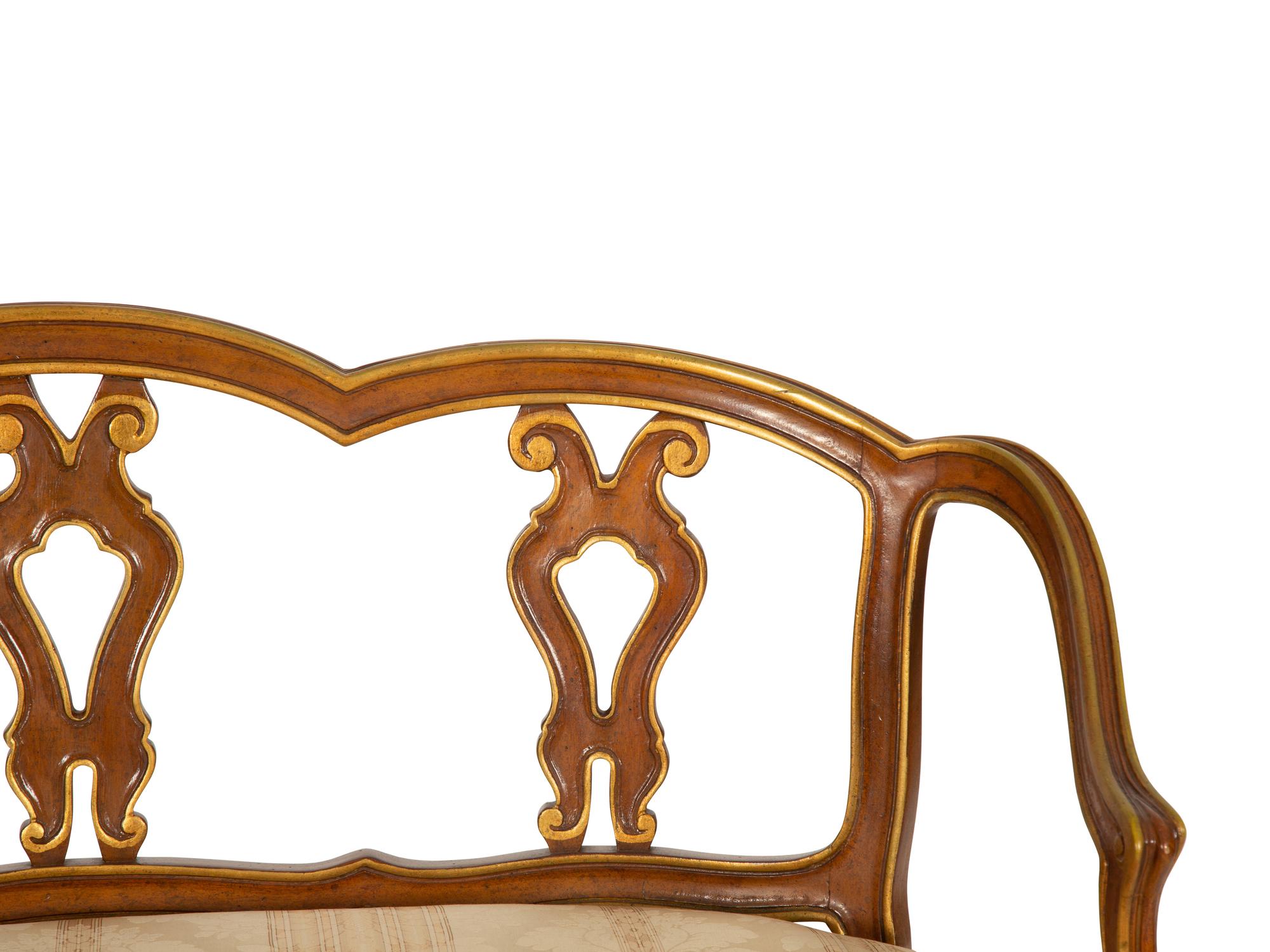 A Continental Painted and Giltwood Settee