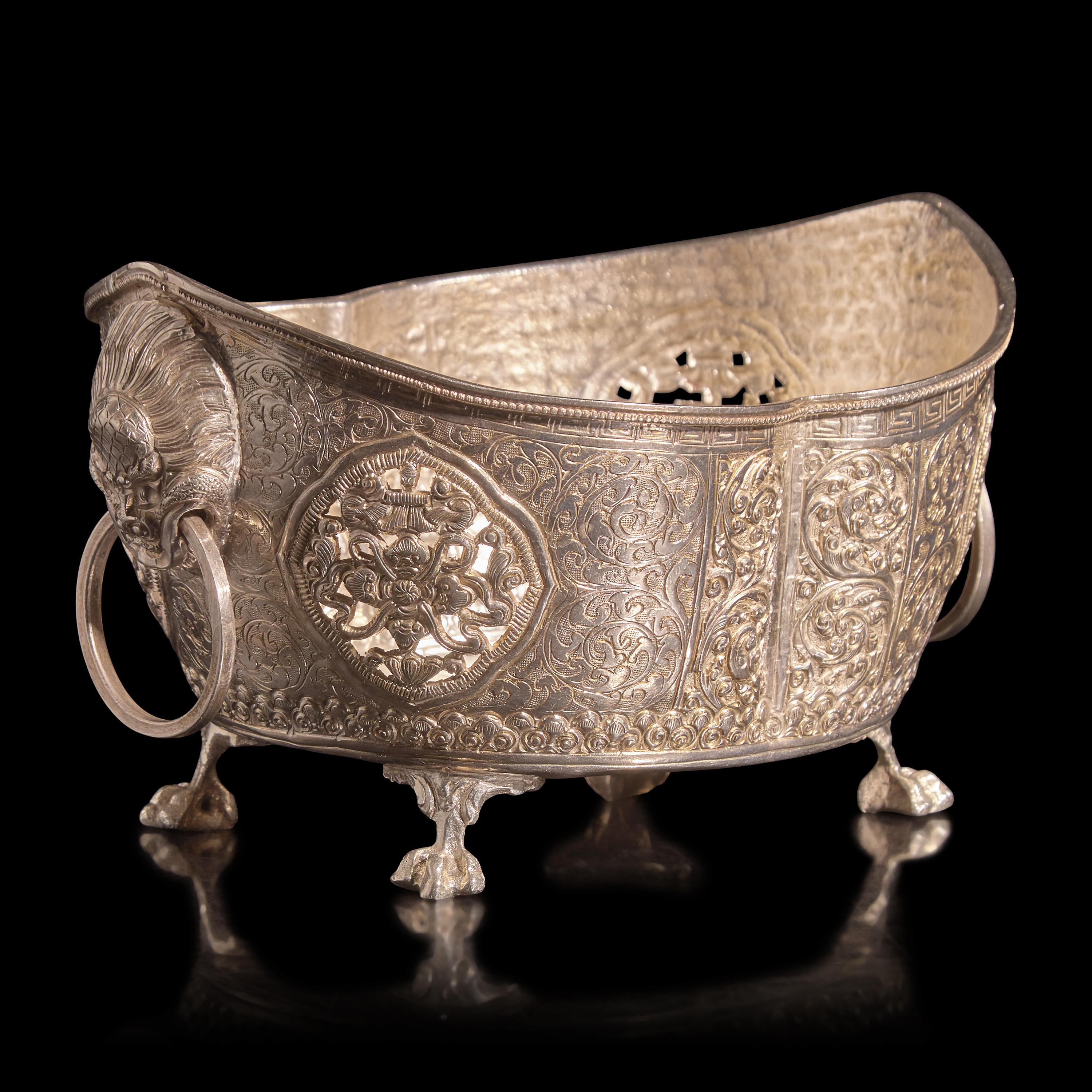 A Chinese or Southeast Asian Silver Alloy Navette-Form Reticulated Footed Bowl — 東南亞銀合金鏨花碗