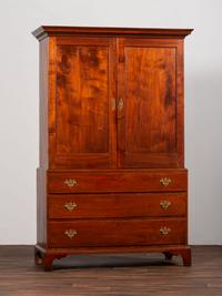 A Chippendale Figured Mahogany Linen Press