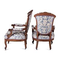 A Pair of Renaissance Revival Carved Walnut Fauteuils