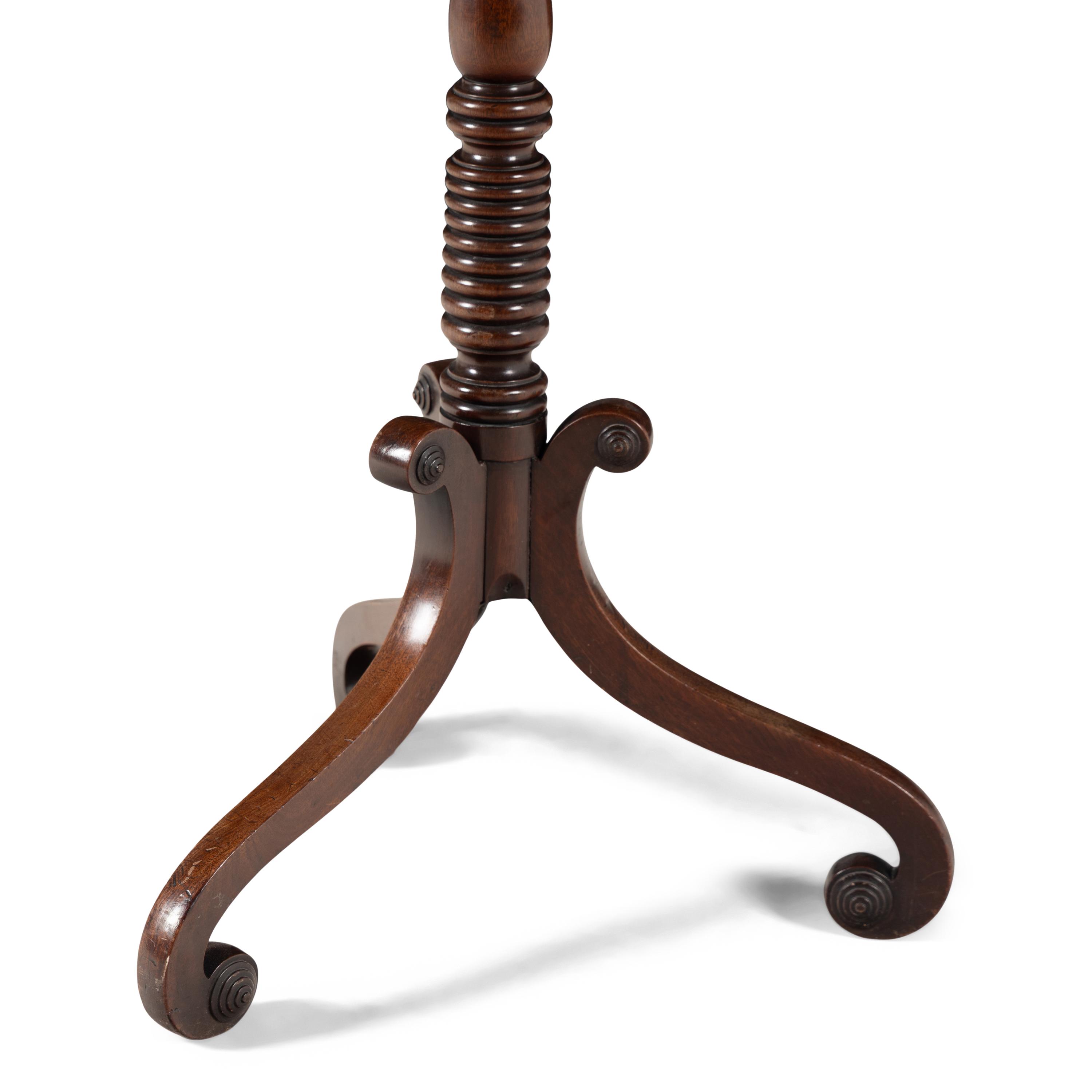 A Late Regency Mahogany Candle Stand
