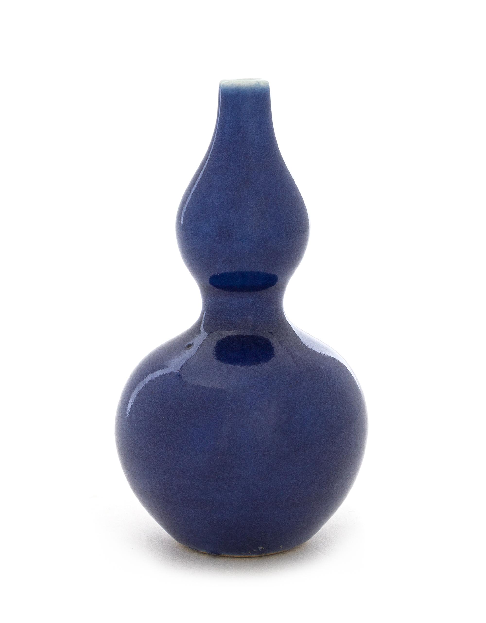 A Small Chinese Blue Glazed Porcelain Double Gourd Vase Height 4 1/2 inches. — 19TH CENTURY