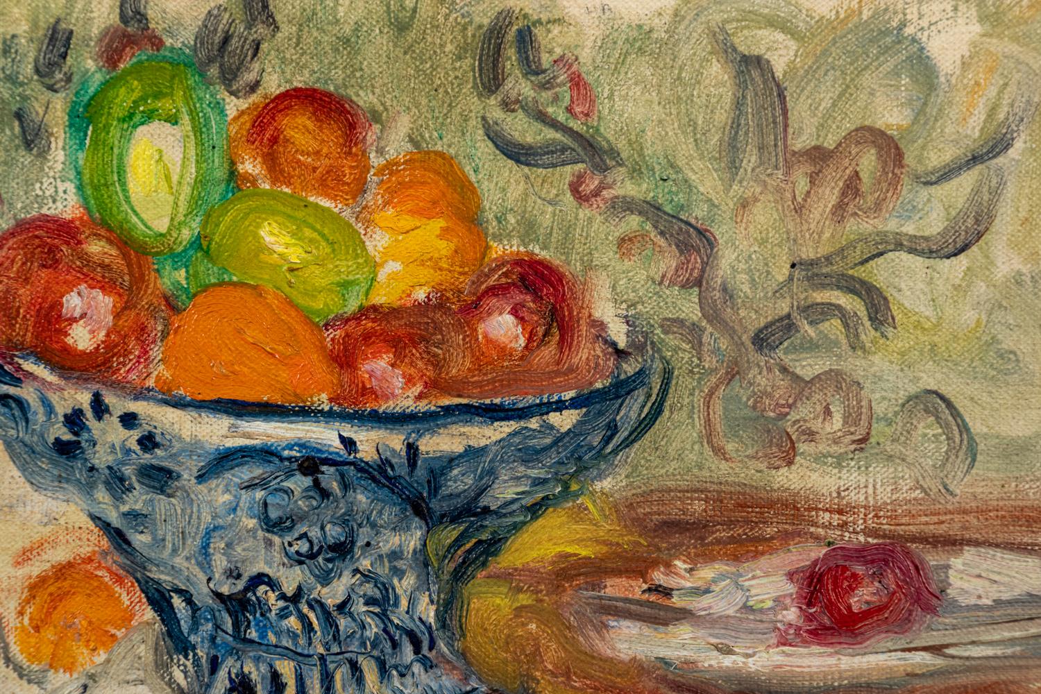 La coupe de grenade aux pommes et aux oranges