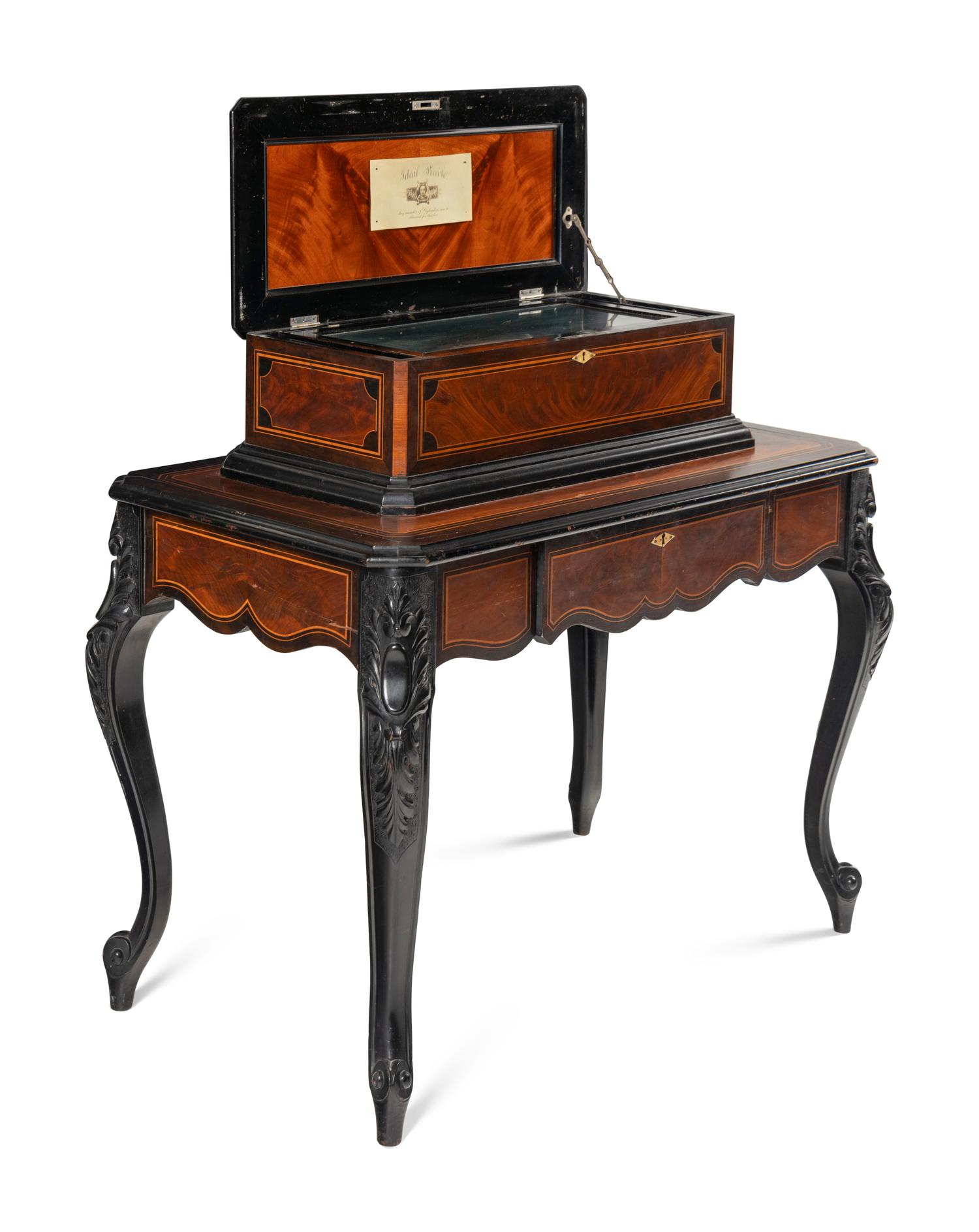 An Ideal Piccolo Music Box on Table by Mermod Frères