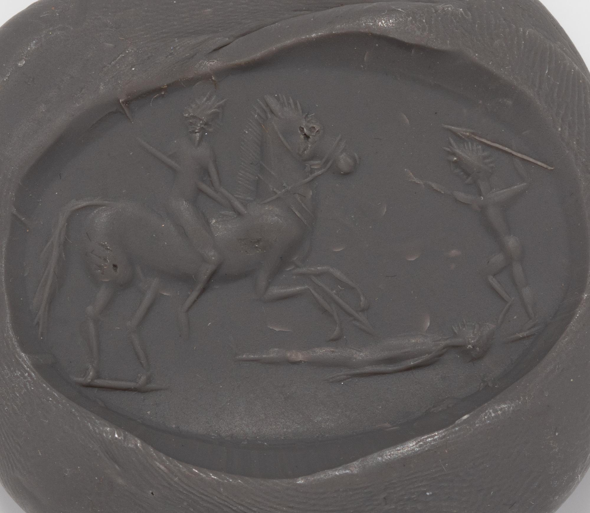 A Greco-Persian Style Chalcedony Scaraboid