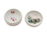 Three Meissen and Berlin (K.P.M.) Porcelain Cup and Saucer Sets