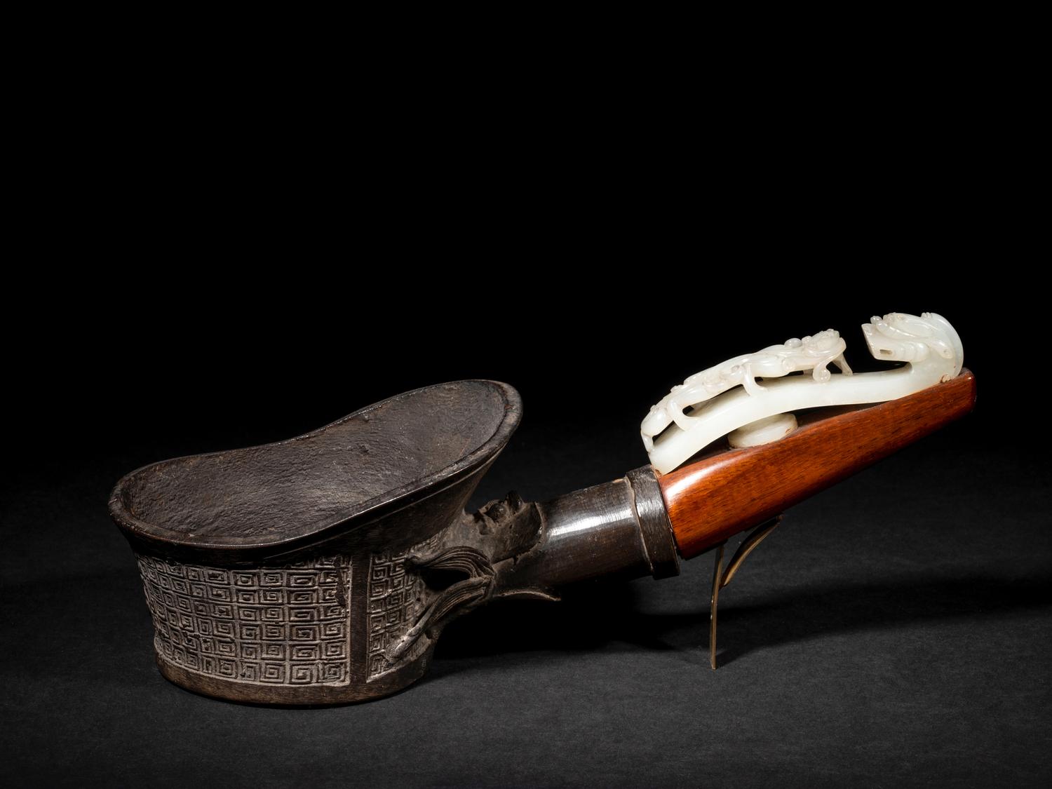 A Chinese White Jade Belt Hook-Mounted Iron