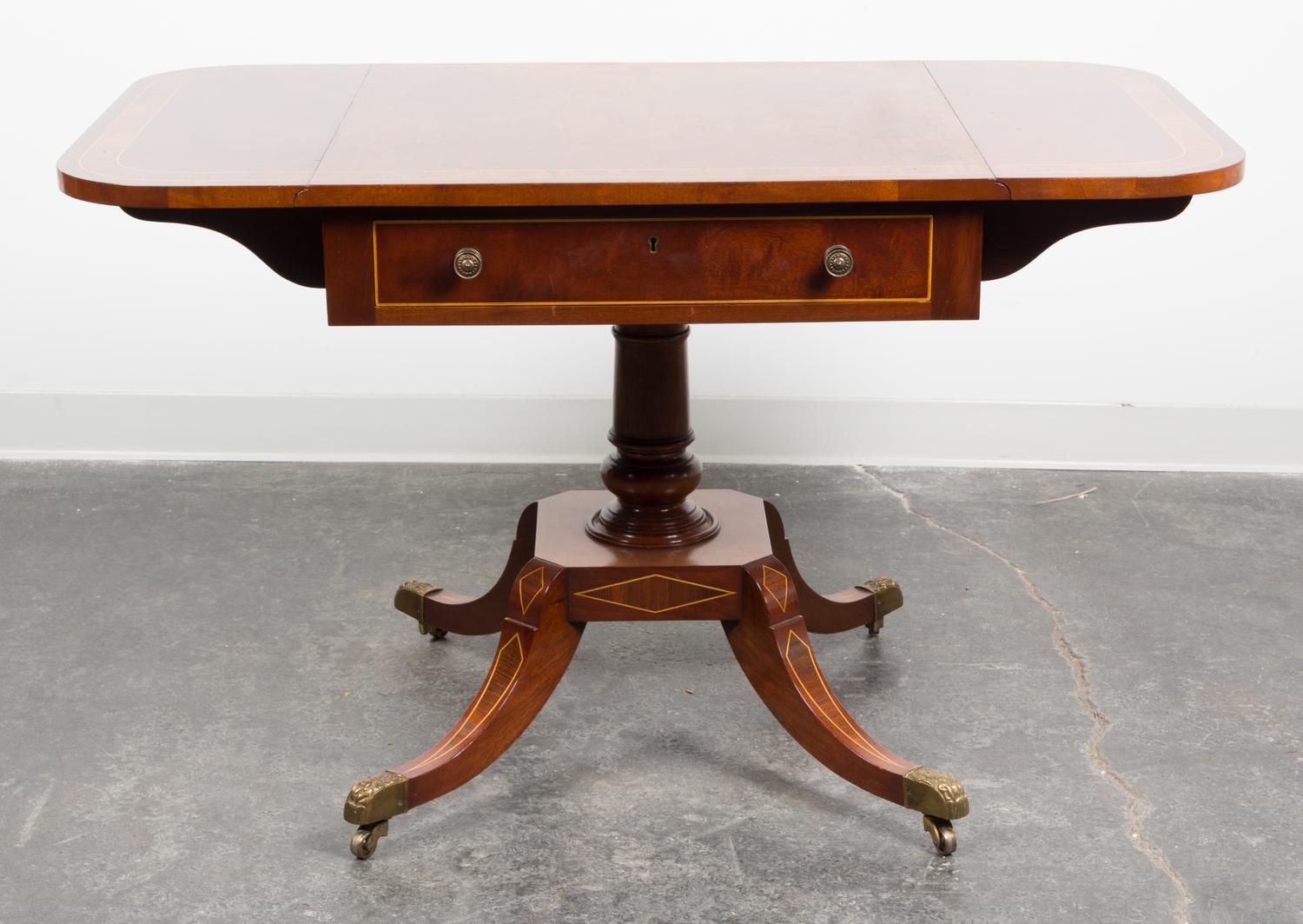 A Regency Style Inlaid Drop-leaf Occasional Table Height 27 3/4 x width 27 x depth 26 1/4 inches (closed).