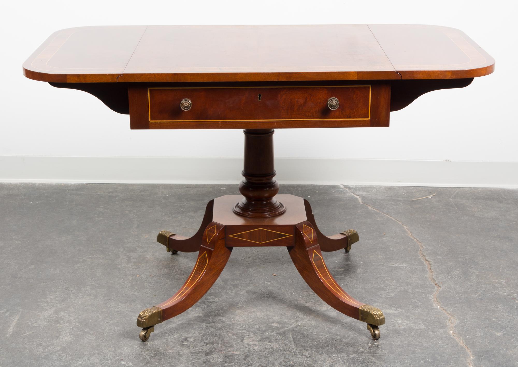 A Regency Style Inlaid Drop-leaf Occasional Table Height 27 3/4 x width 27 x depth 26 1/4 inches (closed).