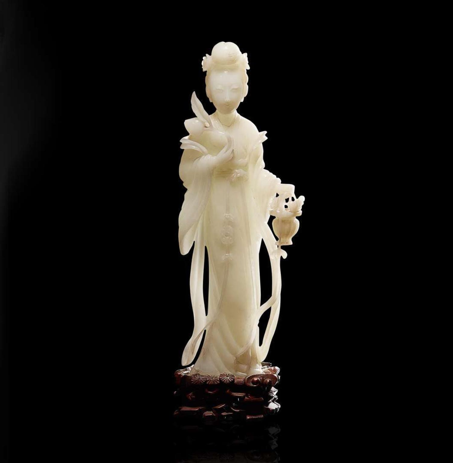 A Chinese carved white jade figure of a meiren 白玉雕美人 19th/early 20th century ????????