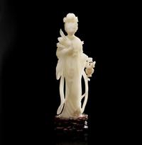 A Chinese carved white jade figure of a meiren 白玉雕美人 19th/early 20th century ????????